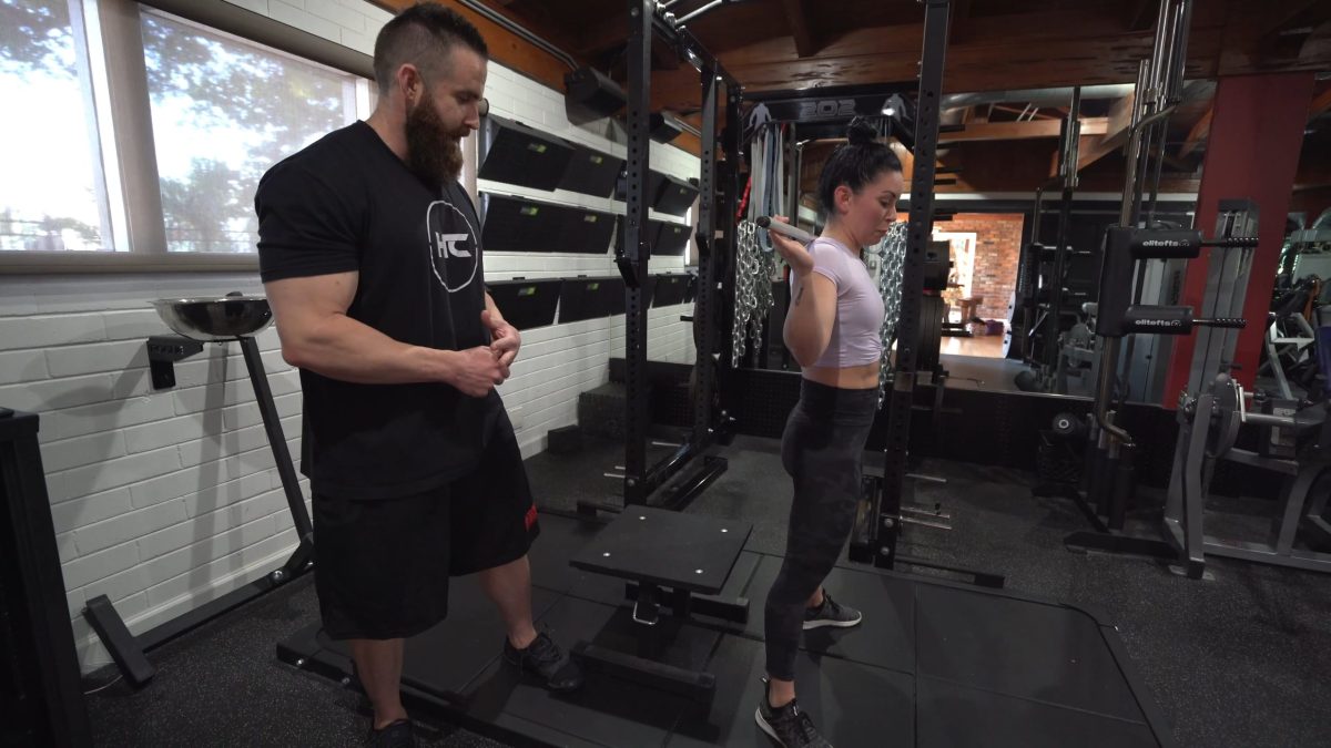 Barbell to a box squat